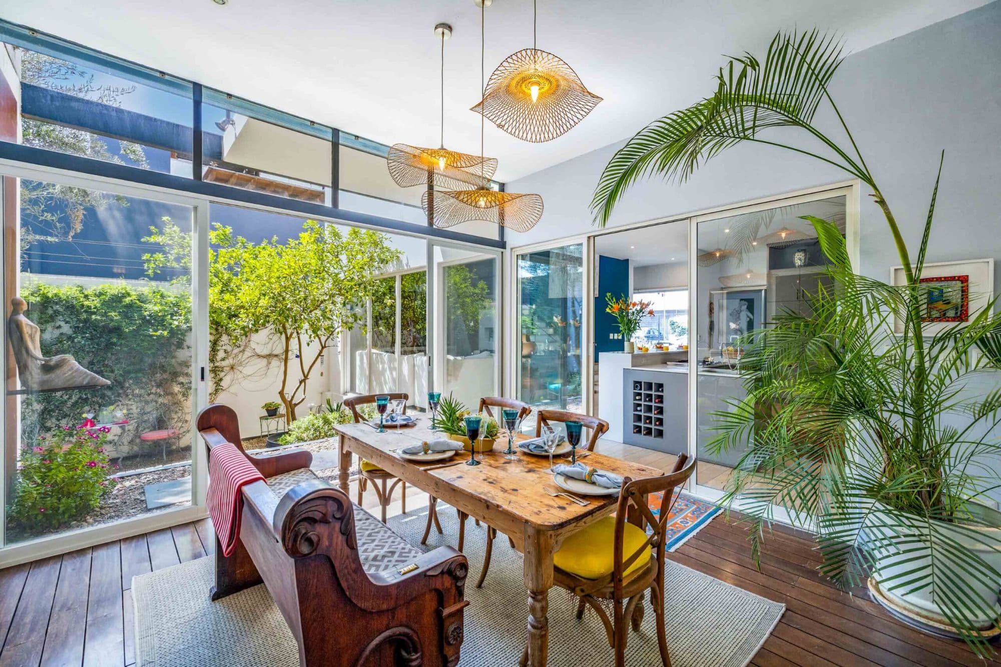 Casa Paraíso — El Paraiso, San Miguel de Allende — photo 6 — luminous dining space, tropical garden views