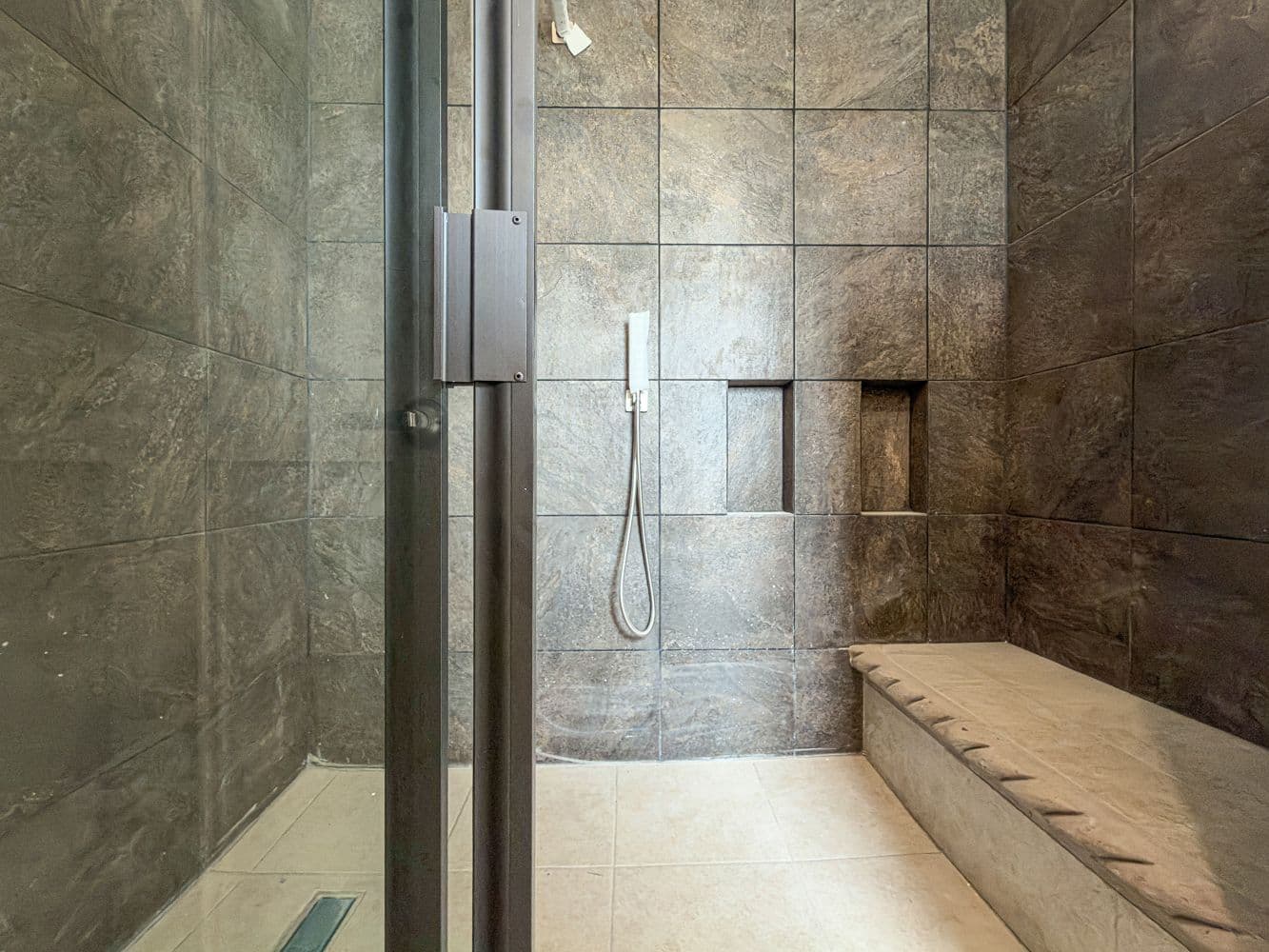 Casa Paulina — Residencial Malanquin la Mesa, San Miguel de Allende — photo 21 — spa-inspired shower with natural stone elegance
