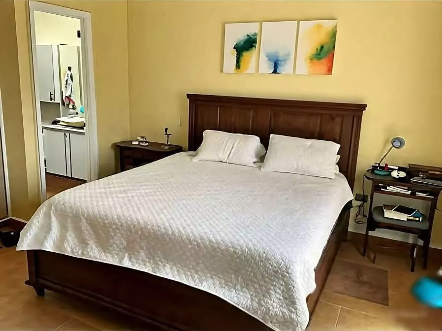 House of Art — San Rafael, San Miguel de Allende — photo 6 — serene master suite, golden natural light