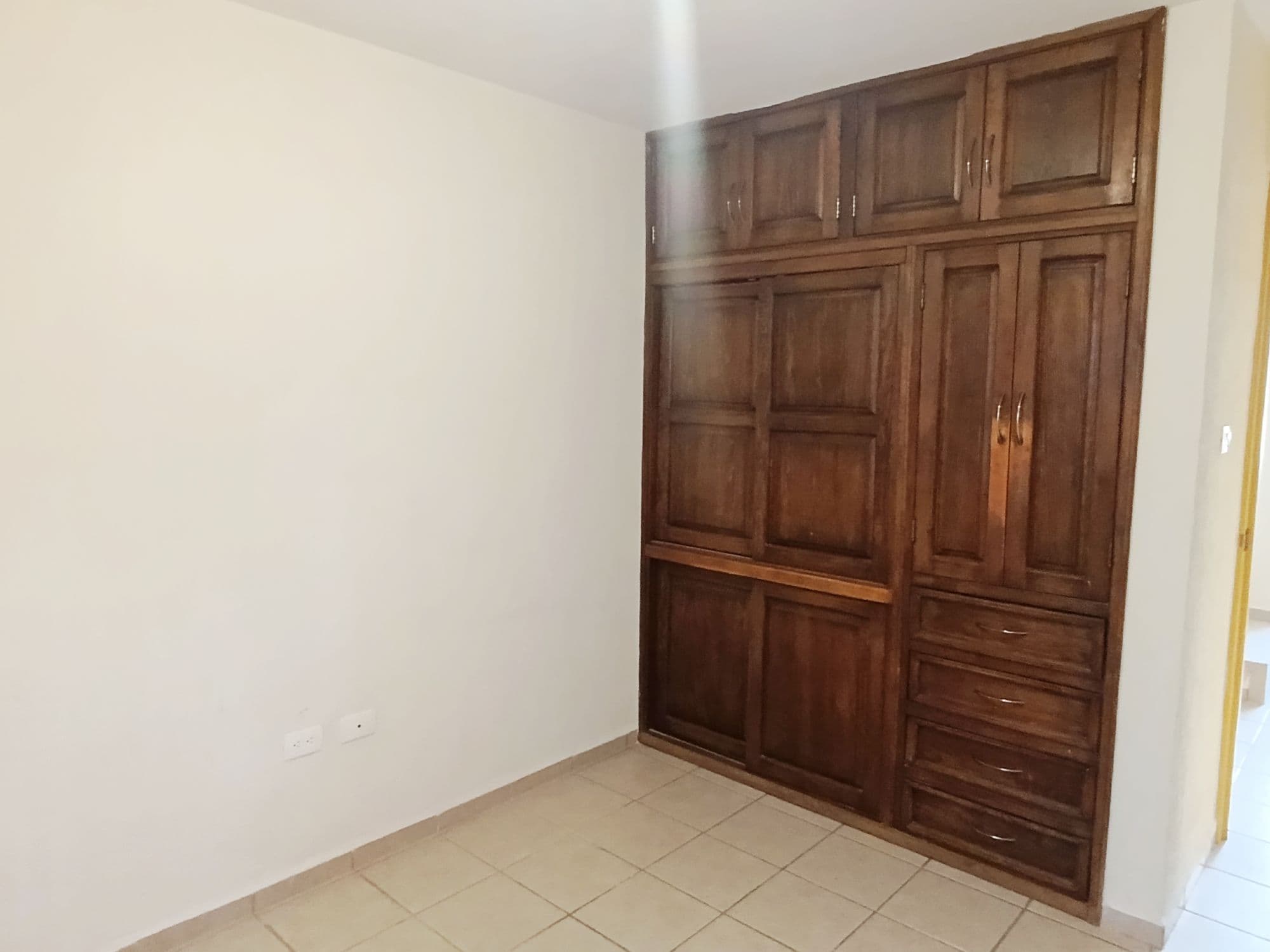 Casa Sauz — Las Brisas, San Miguel de Allende — photo 10 — spacious bedroom with handcrafted wood cabinetry