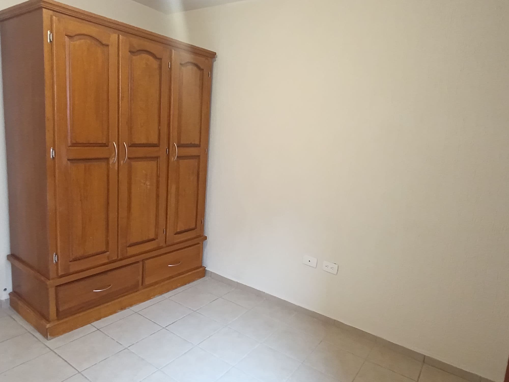 Casa Sauz — Las Brisas, San Miguel de Allende — photo 5 — spacious bedroom with classic wooden armoire
