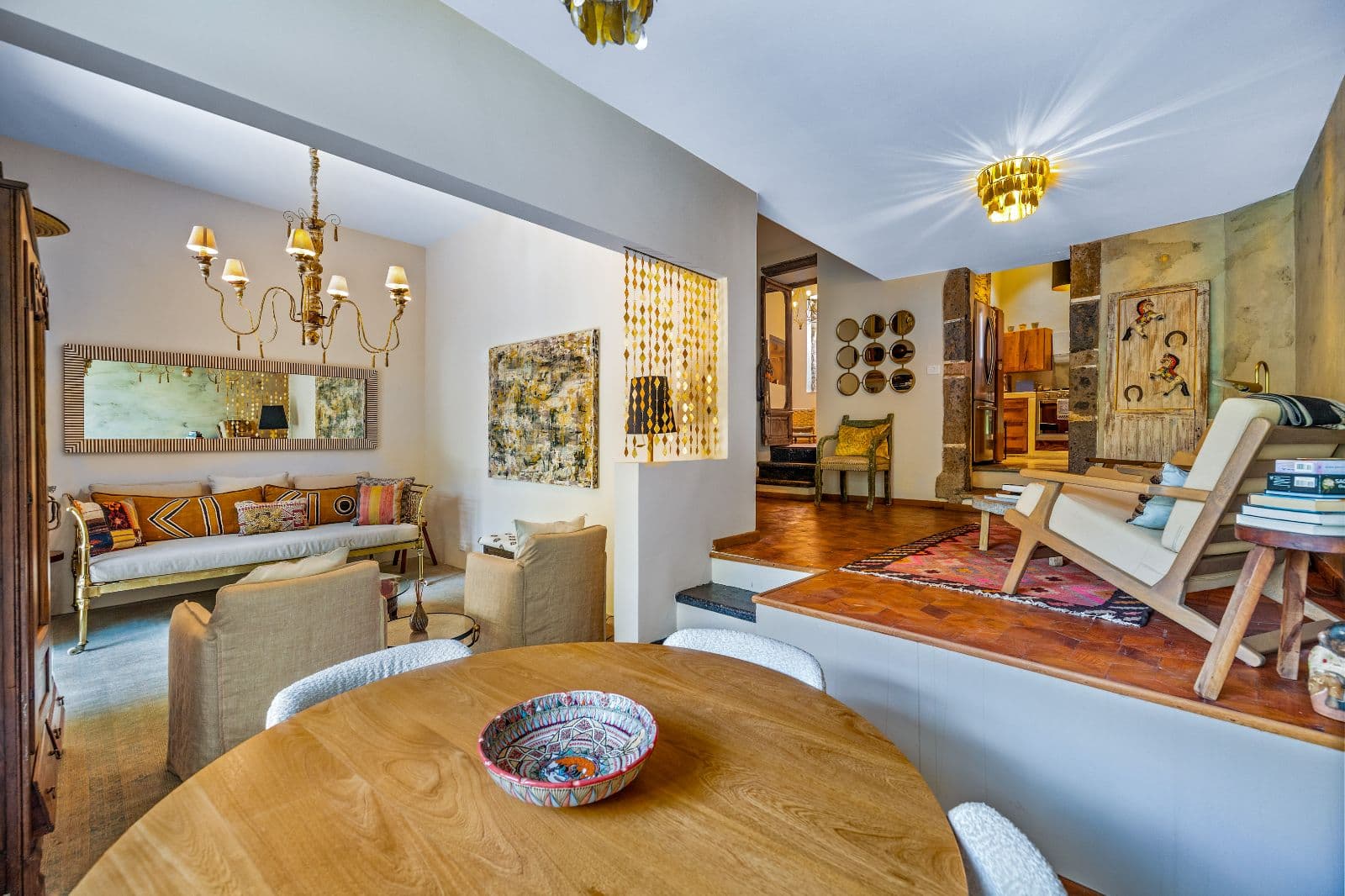 Casa Entresueño — Centro, San Miguel de Allende — photo 7 — golden-lit designer living space, curated elegance
