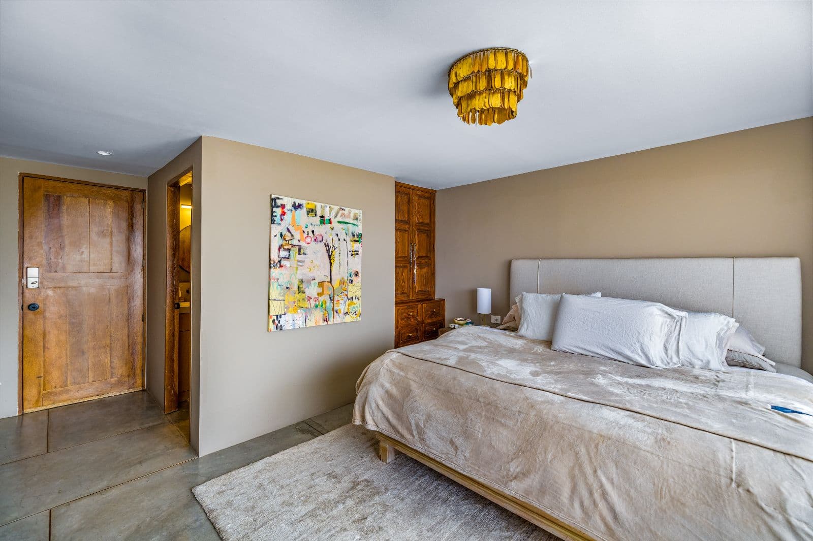 Casa Entresueño — Centro, San Miguel de Allende — photo 22 — serene master suite, warm architectural elegance