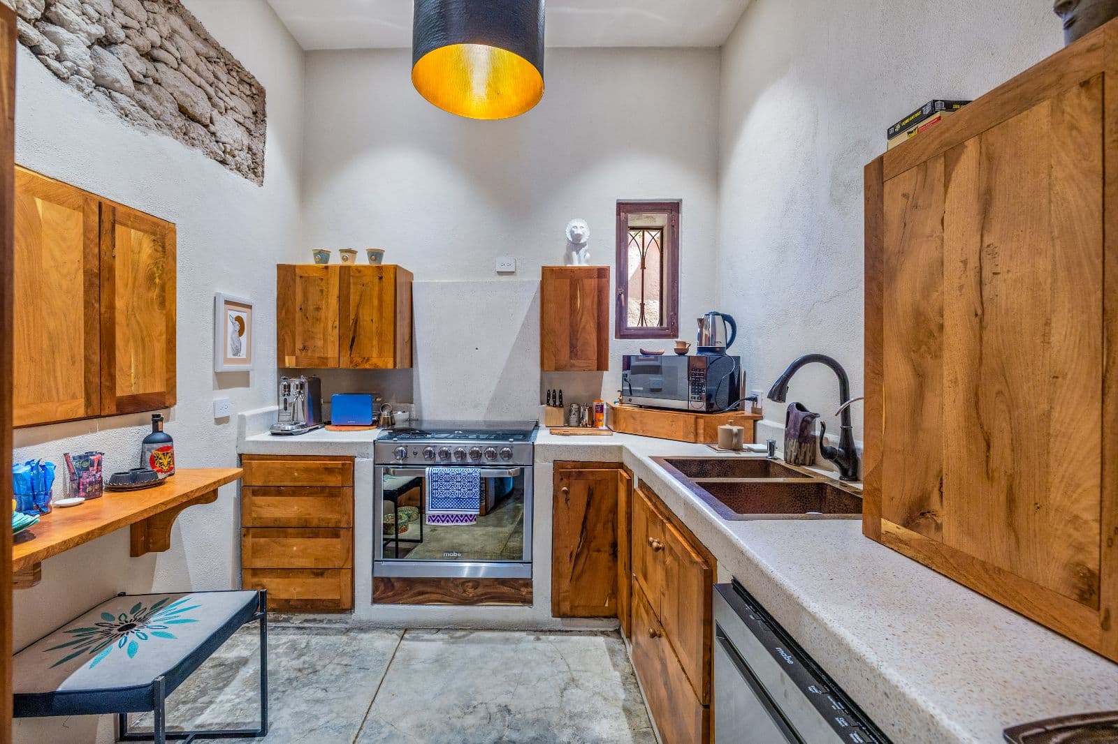 Casa Entresueño — Centro, San Miguel de Allende — photo 11 — charming rustic kitchen, golden ambient light