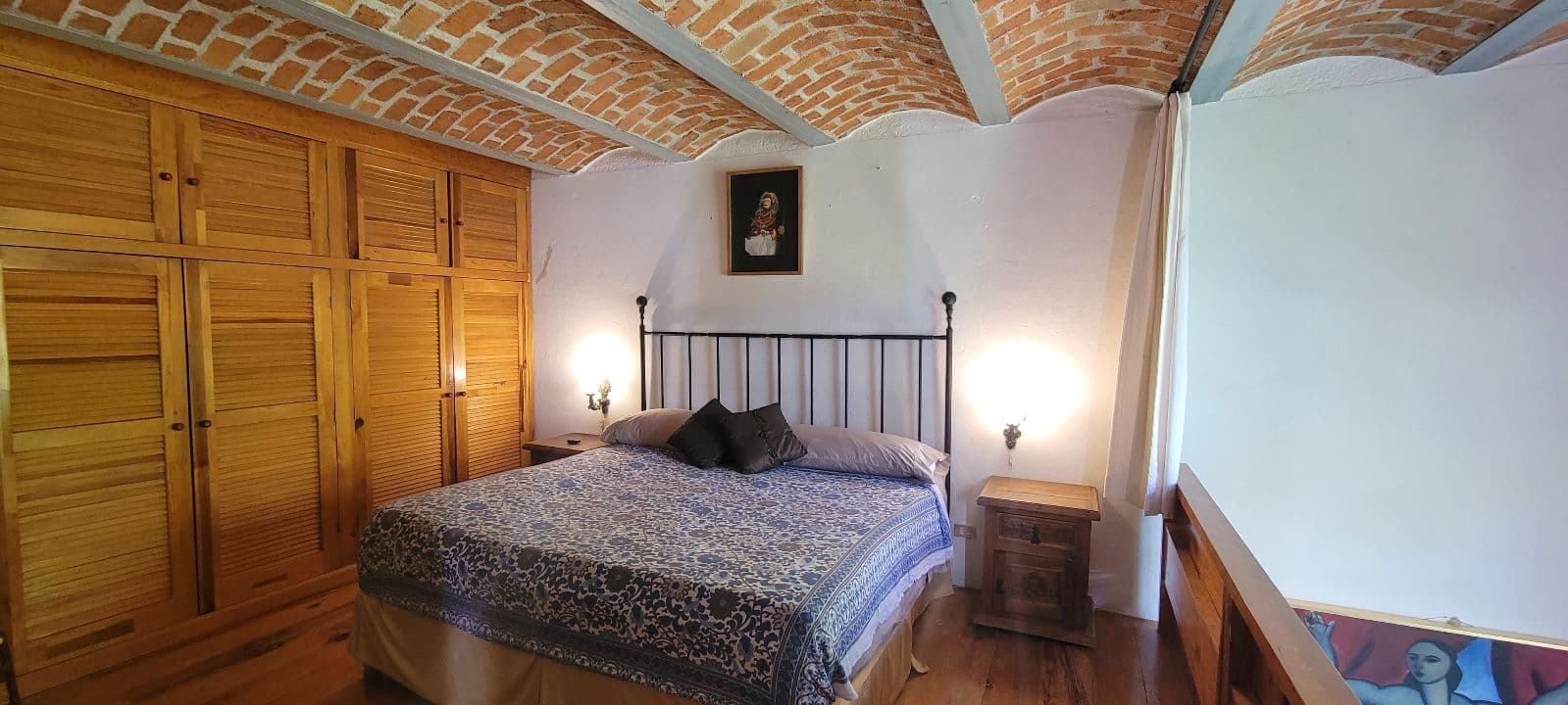 Casa Tucevich — El Obraje, San Miguel de Allende — photo 18 — charming colonial bedroom, exposed brick elegance