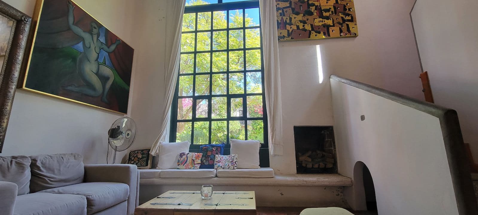 Casa Tucevich — El Obraje, San Miguel de Allende — photo 9 — luminous living room, soaring windows, garden views