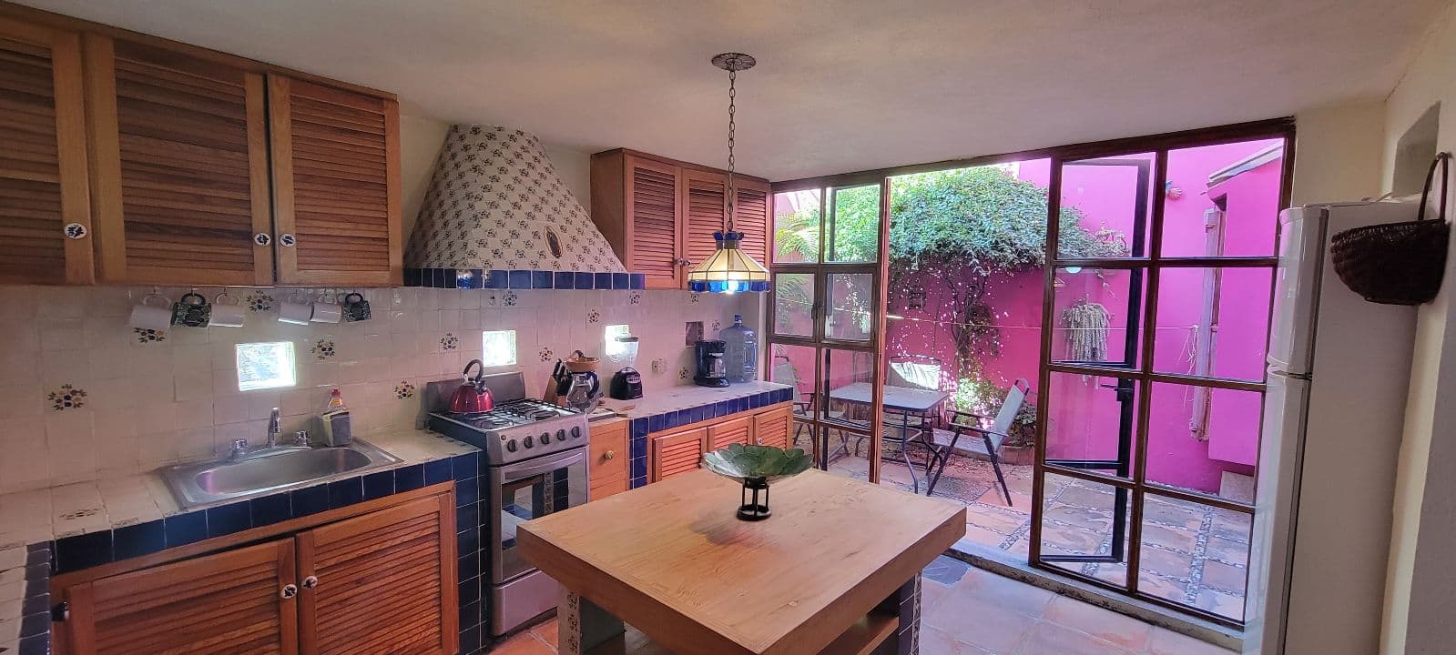 Casa Tucevich — El Obraje, San Miguel de Allende — photo 15 — charming traditional kitchen with courtyard views