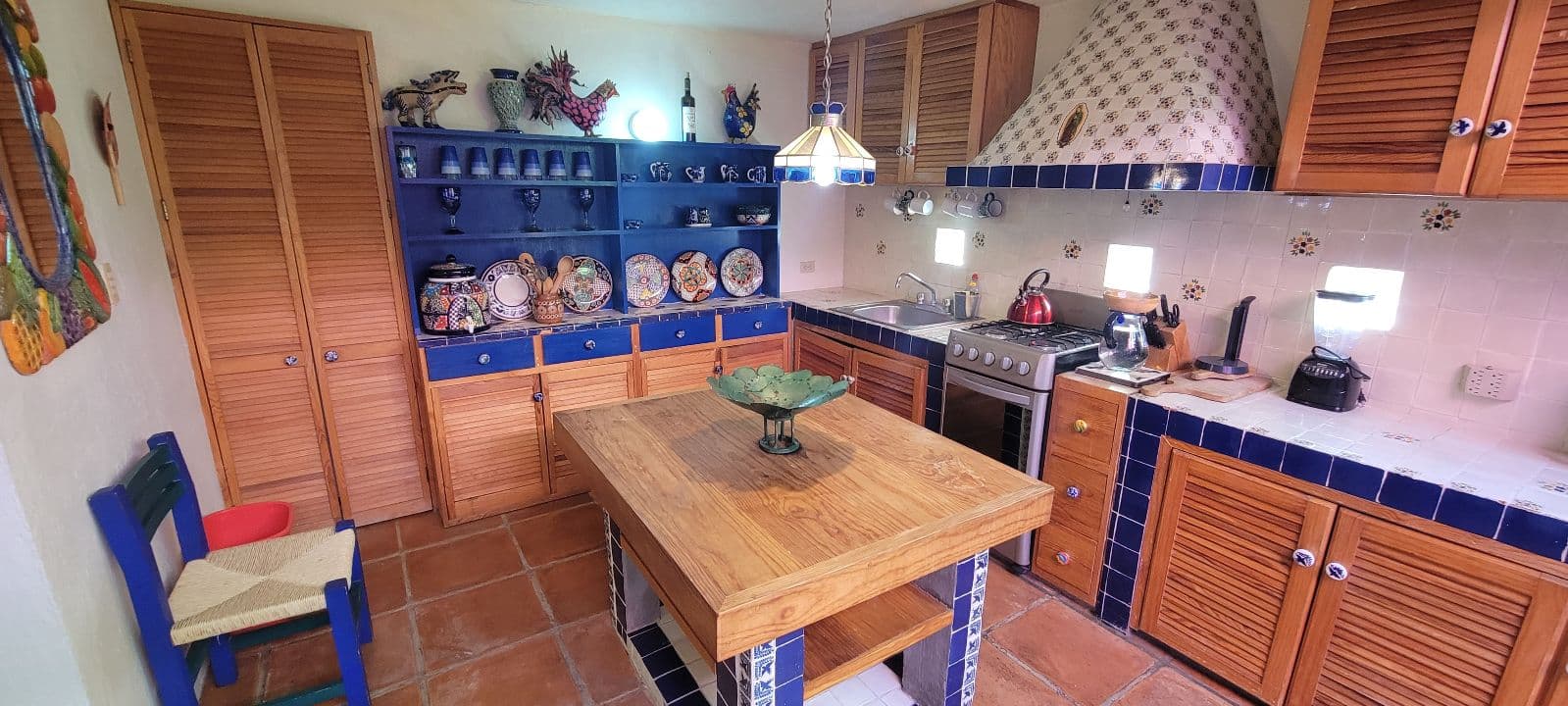 Casa Tucevich — El Obraje, San Miguel de Allende — photo 14 — authentic colonial kitchen, vibrant artisanal details