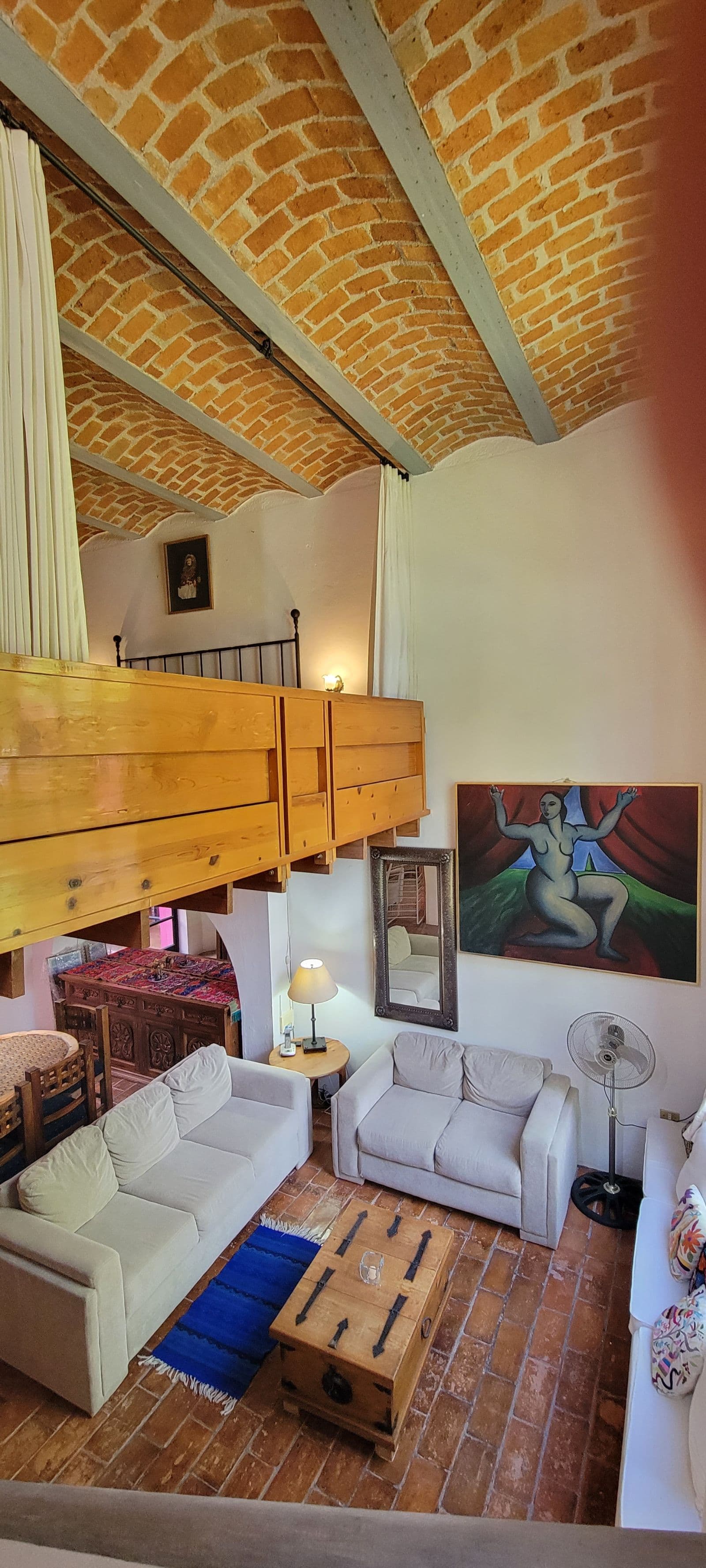 Casa Tucevich — El Obraje, San Miguel de Allende — photo 17 — soaring exposed brick, artistic loft living