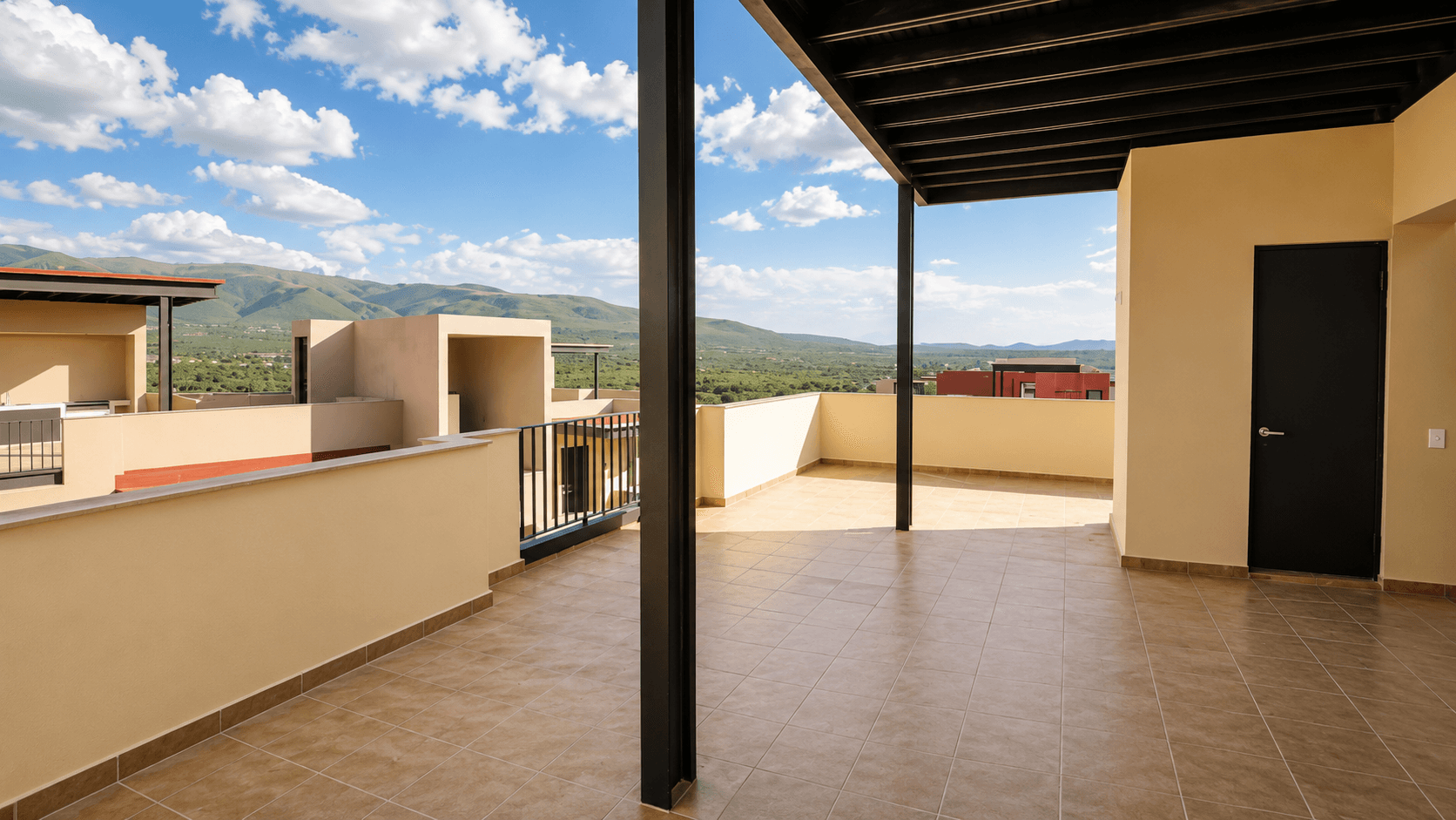 Penthouse Punta del Cielo — La Lejona, San Miguel de Allende — photo 18 — expansive terrace with sweeping mountain views