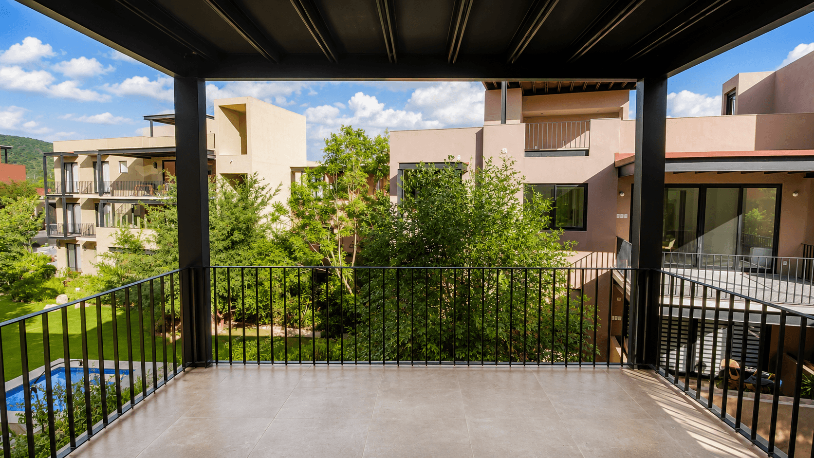 Penthouse Punta del Cielo — La Lejona, San Miguel de Allende — photo 17 — panoramic terrace overlooking lush gardens