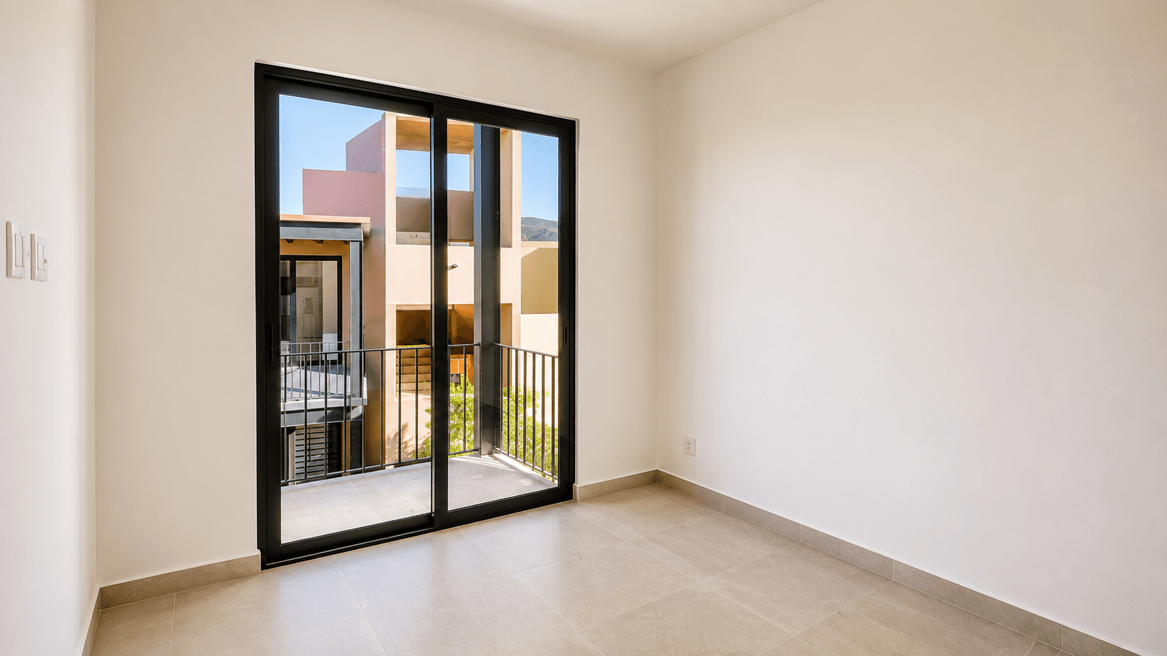 Penthouse Punta del Cielo — La Lejona, San Miguel de Allende — photo 7 — sunlit bedroom opens to panoramic views