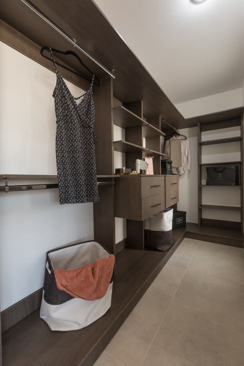 Oleo Van Gogh Roof Top 6 — Zirándaro, San Miguel de Allende — photo 7 — sophisticated walk-in closet with custom cabinetry