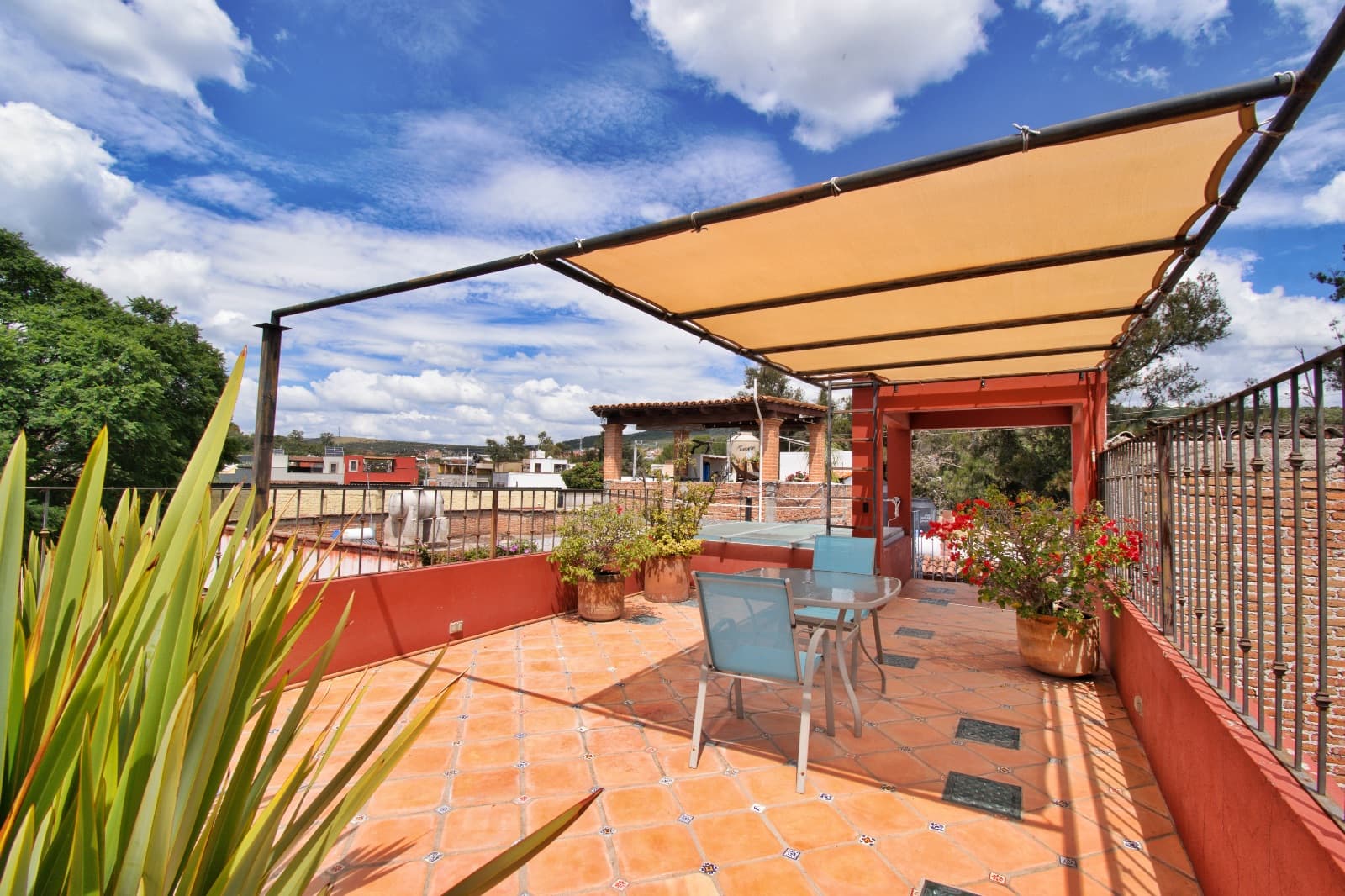 Casa Colores — Guadalupe, San Miguel de Allende — photo 9 — expansive terracotta rooftop with panoramic views