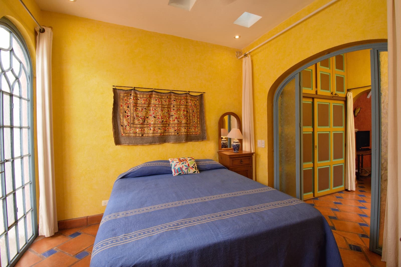 Casa Colores — Guadalupe, San Miguel de Allende — photo 17 — vibrant colonial bedroom with authentic charm