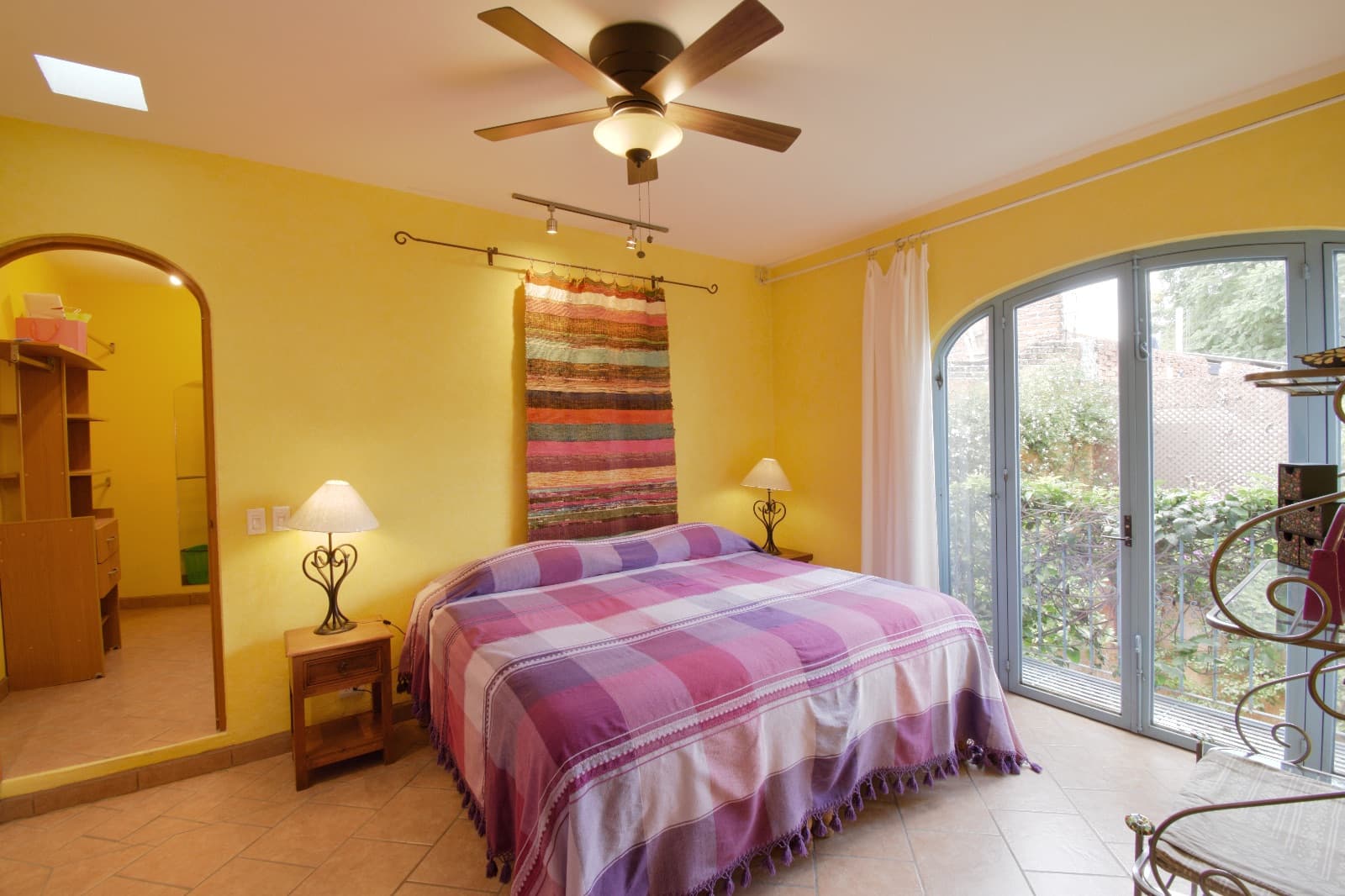 Casa Colores — Guadalupe, San Miguel de Allende — photo 3 — sunlit master suite, vibrant mexican charm