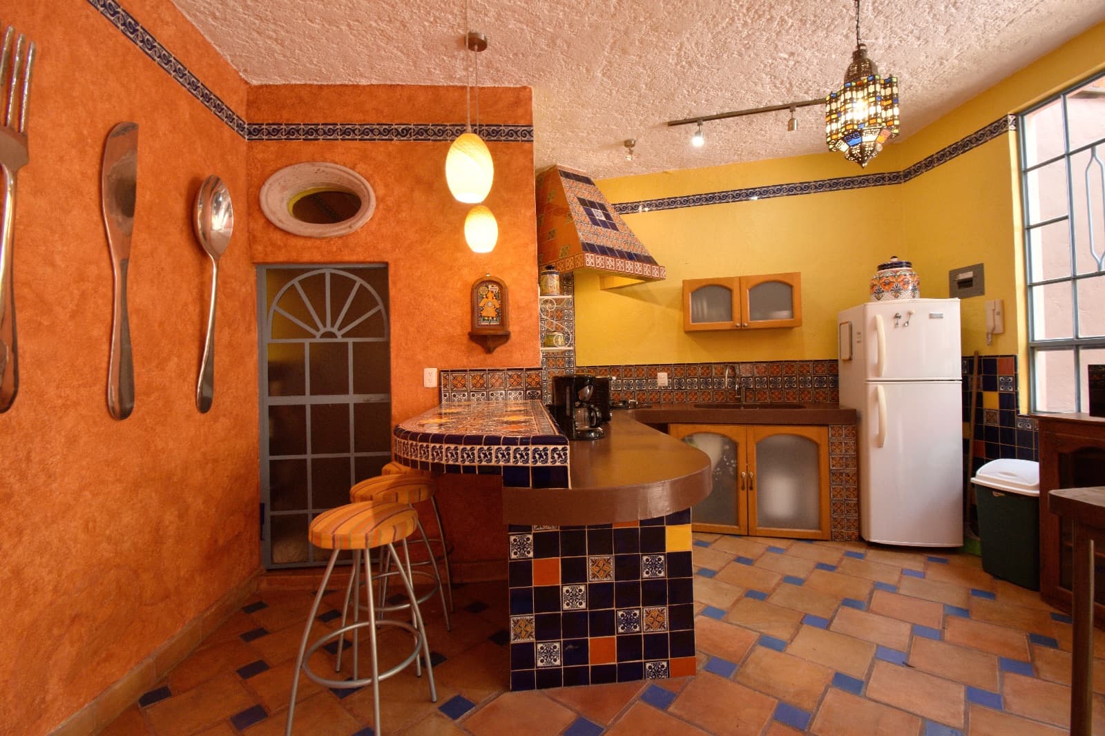 Casa Colores — Guadalupe, San Miguel de Allende — photo 13 — vibrant traditional mexican kitchen elegance