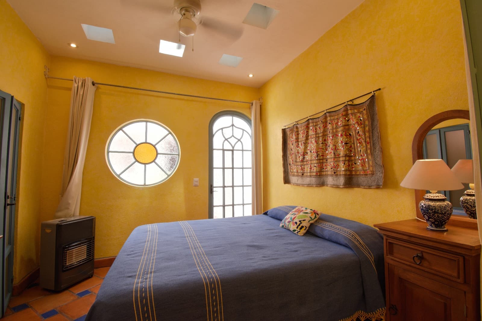 Casa Colores — Guadalupe, San Miguel de Allende — photo 16 — radiant sunlit bedroom, vibrant mexican charm