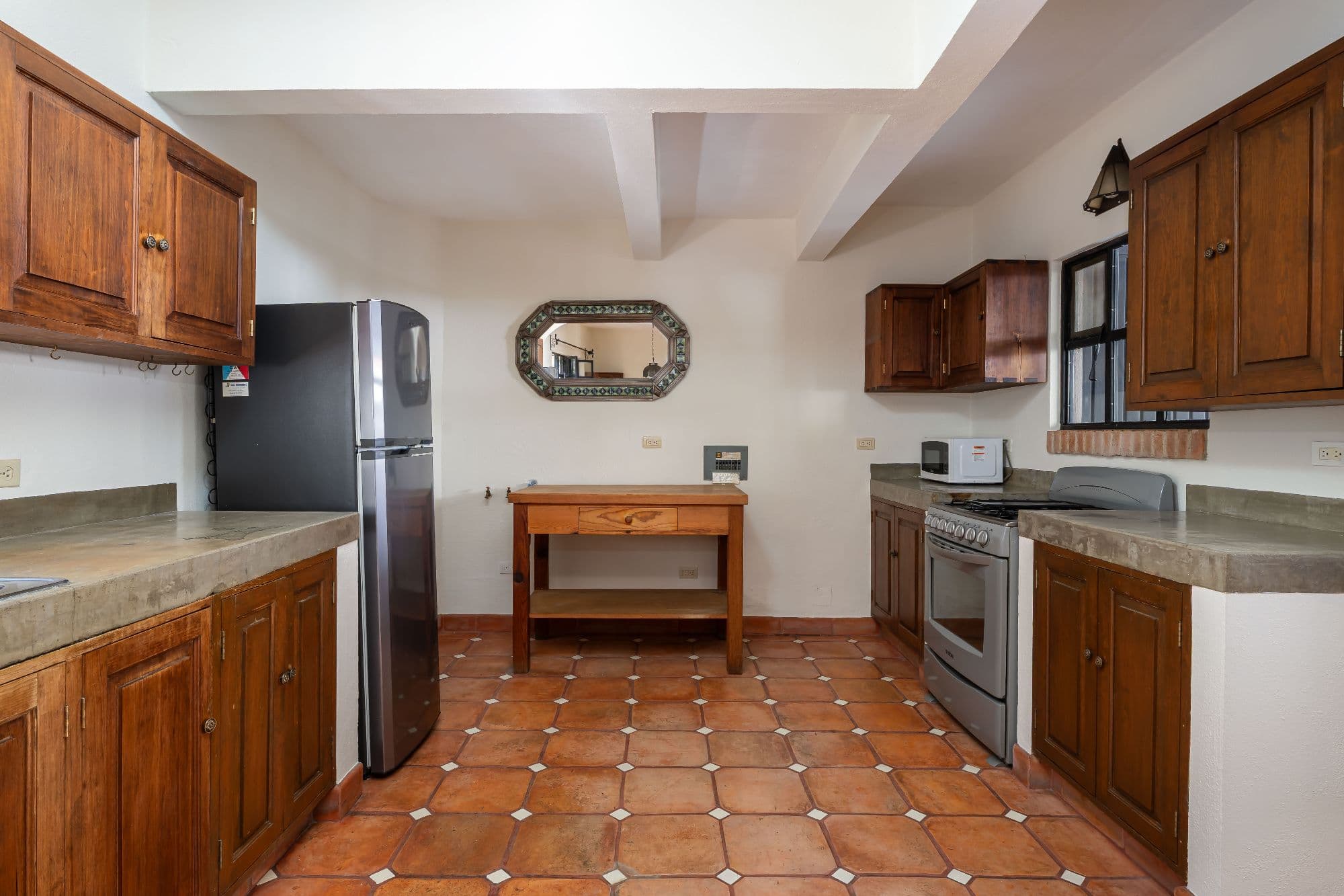 Casa Hidden Nook — San Antonio, San Miguel de Allende — photo 6 — traditional mexican kitchen, beautifully appointed