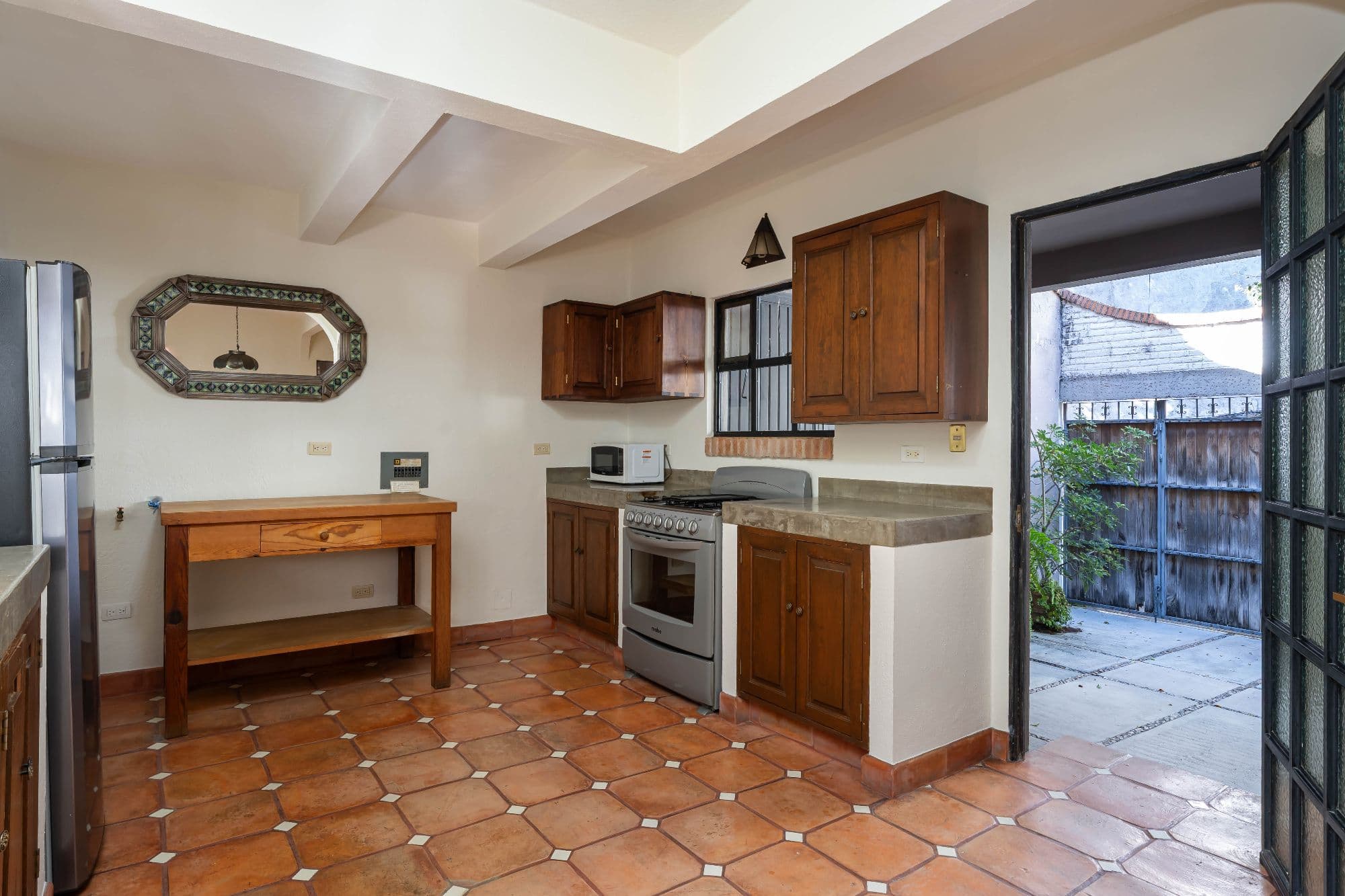 Casa Hidden Nook — San Antonio, San Miguel de Allende — photo 5 — authentic colonial kitchen with courtyard views