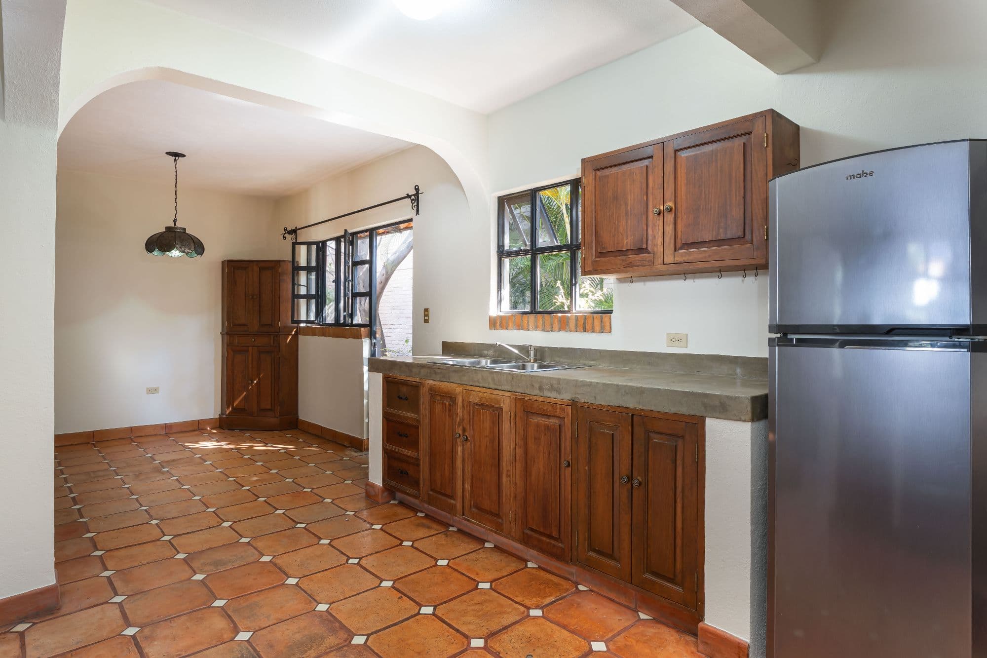 Casa Hidden Nook — San Antonio, San Miguel de Allende — photo 4 — charming traditional kitchen, rustic wood cabinetry