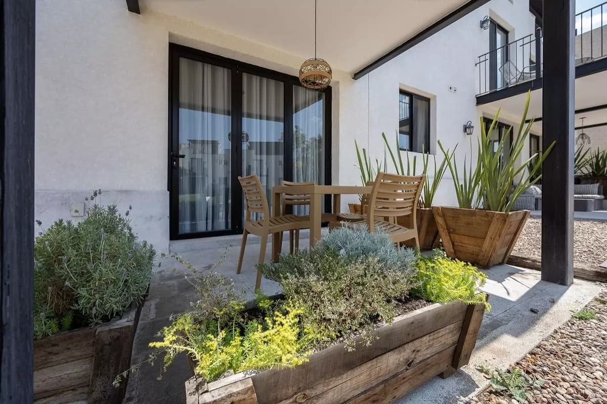 Casa Alegria — Atascadero (Arcos de San Miguel), San Miguel de Allende — photo 16 — serene courtyard with mature gardens
