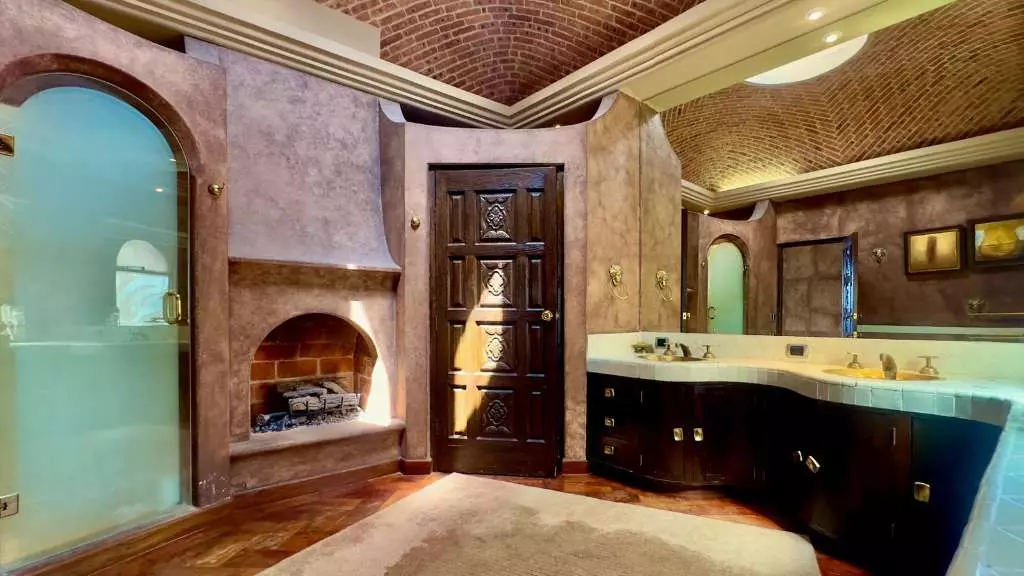 La Raiz De Las Nubes Los Balcones — Balcones, San Miguel de Allende — photo 5 — rustic luxury master bath with fireplace