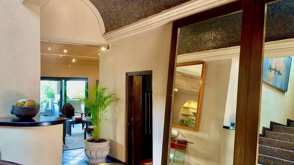 La Raiz De Las Nubes Los Balcones — Balcones, San Miguel de Allende — photo 7 — sophisticated entrance with warm ambiance