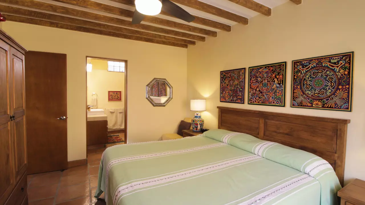 Casa San Antonio — San Antonio, San Miguel de Allende — photo 9 — warm colonial bedroom, artisan charm