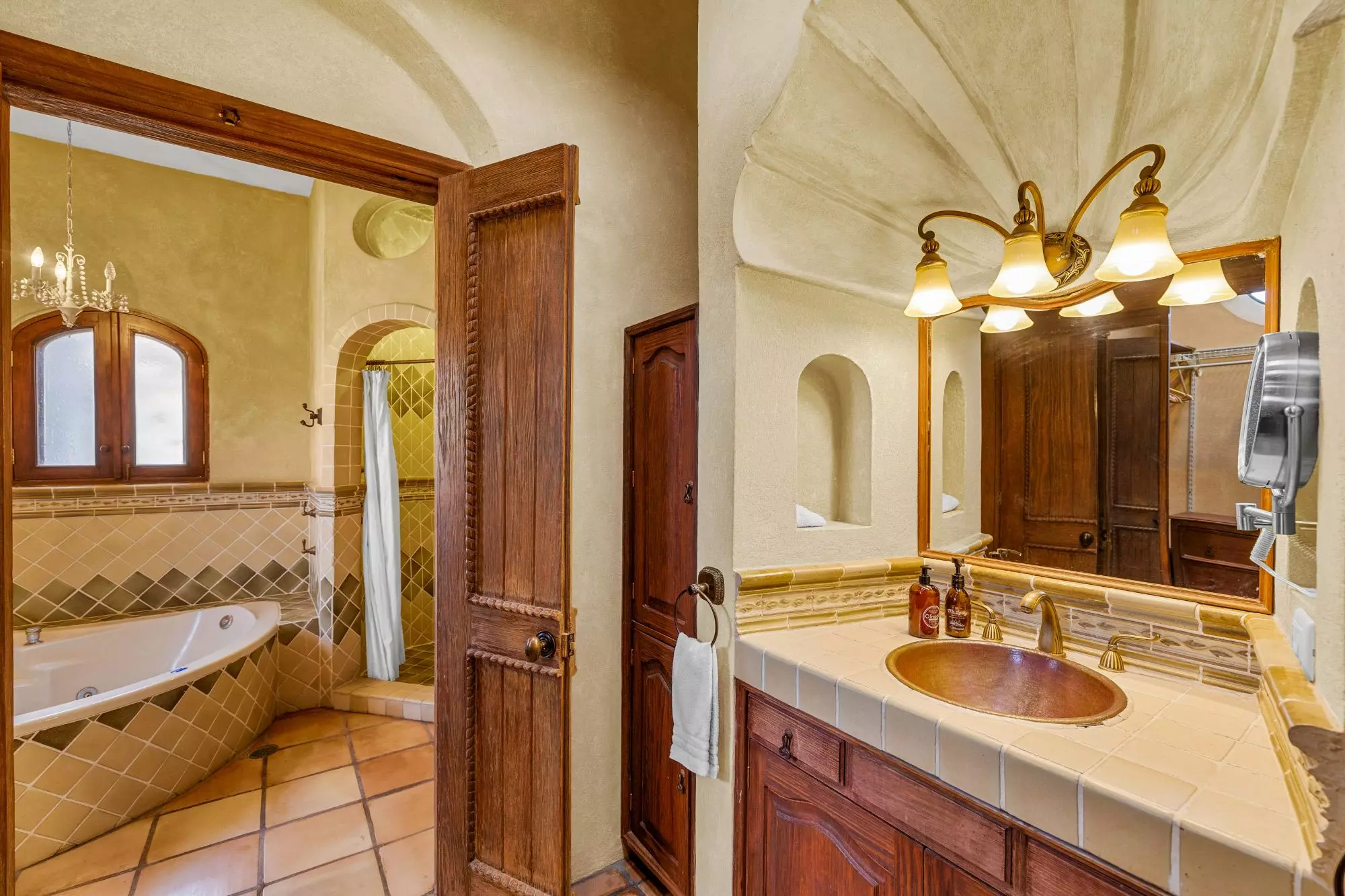 Casa Del Obraje — El Obraje, San Miguel de Allende — photo 26 — elegant master bath with rustic charm