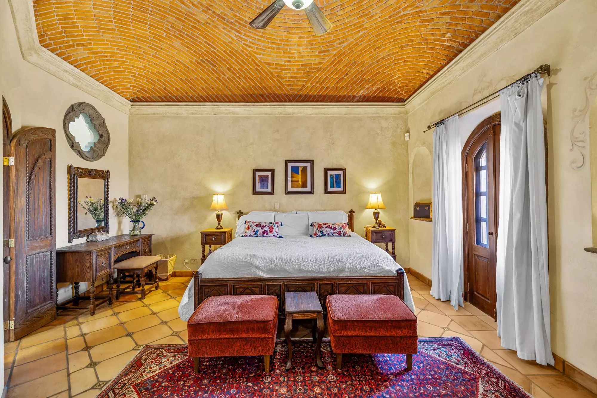 Casa Del Obraje — El Obraje, San Miguel de Allende — photo 2 — elegant colonial bedroom, soaring brick ceiling