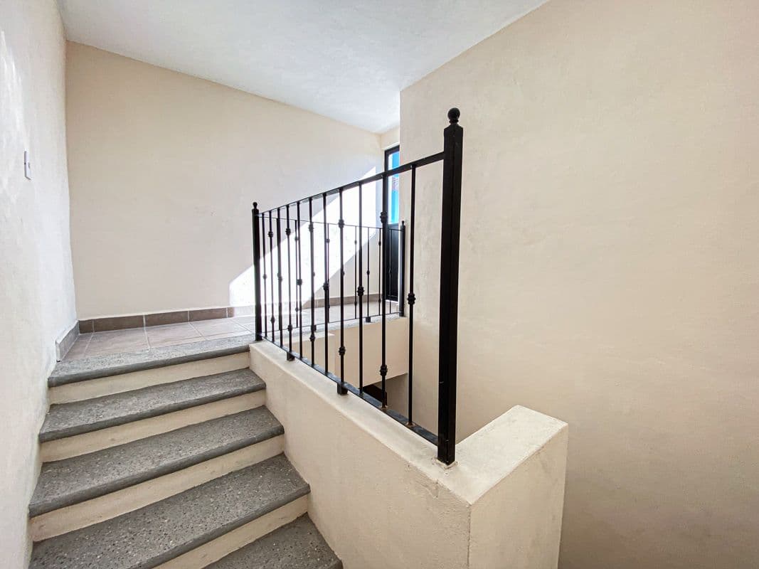 Casa Laura — Las Brisas, San Miguel de Allende — photo 17 — elegant staircase with artisan railings