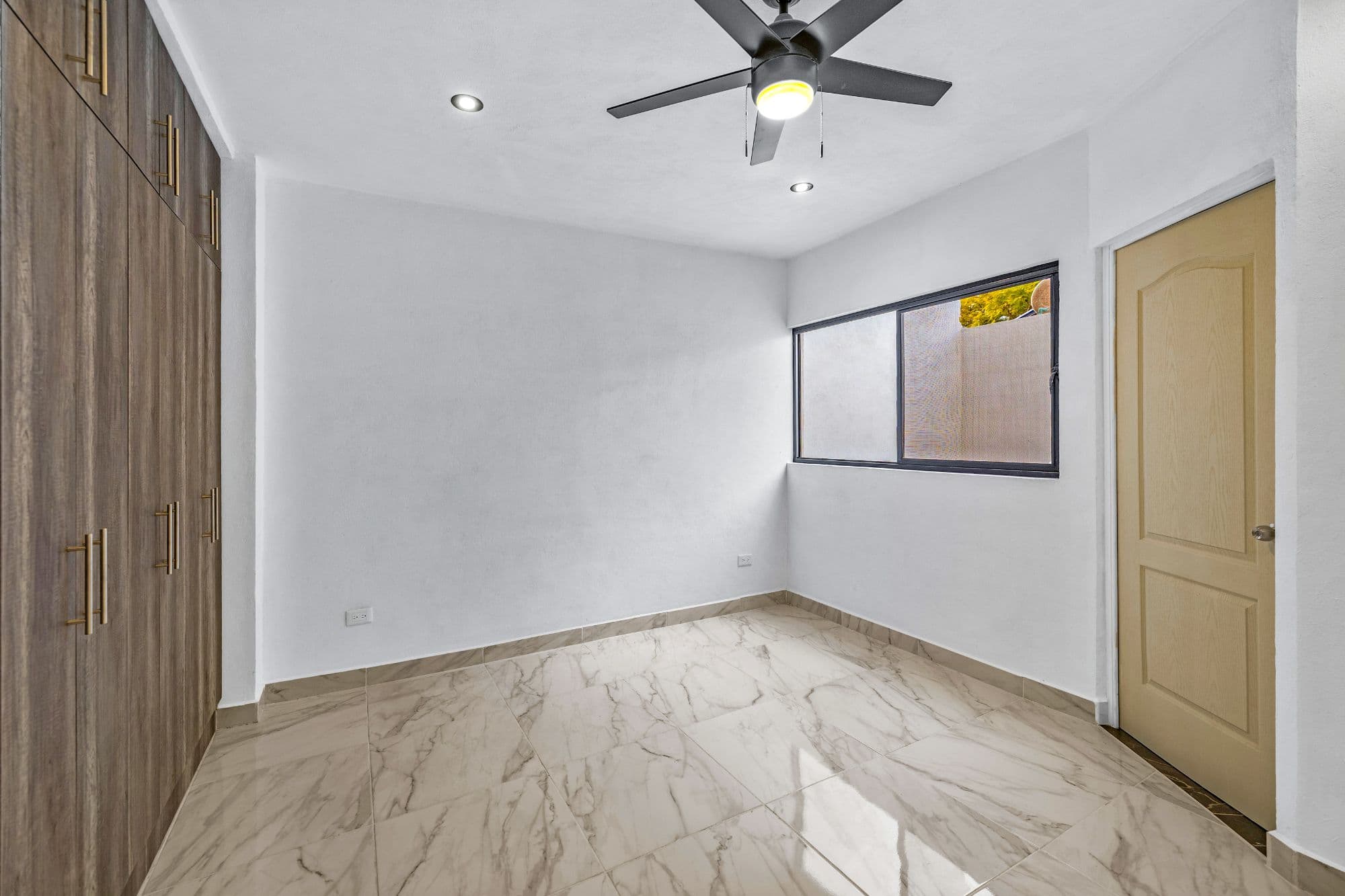 Casa Margarito — Guadalupe, San Miguel de Allende — photo 9 — bright, sophisticated bedroom with marble finishes