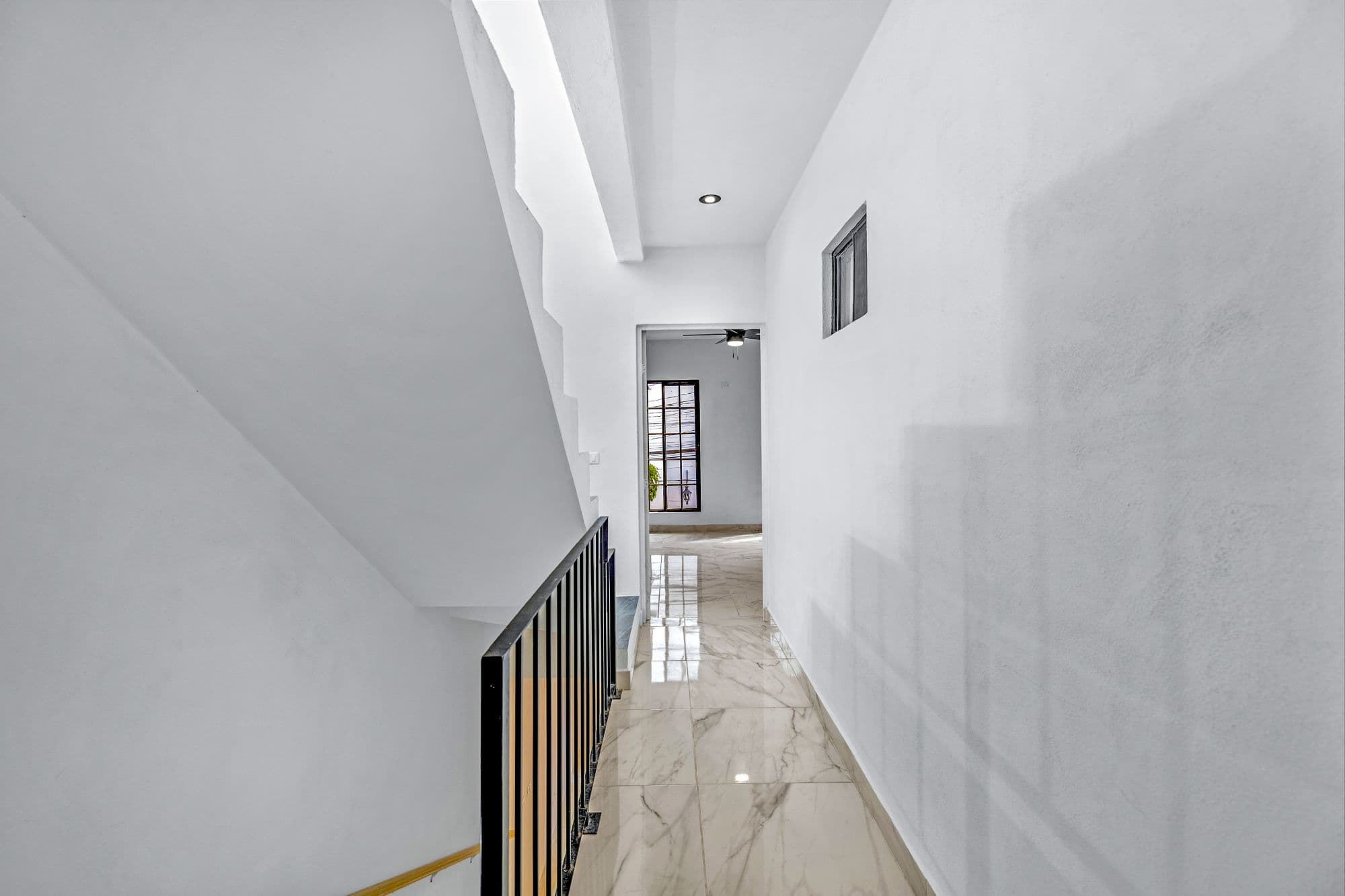 Casa Margarito — Guadalupe, San Miguel de Allende — photo 8 — bright hallway, elegant marble finishes