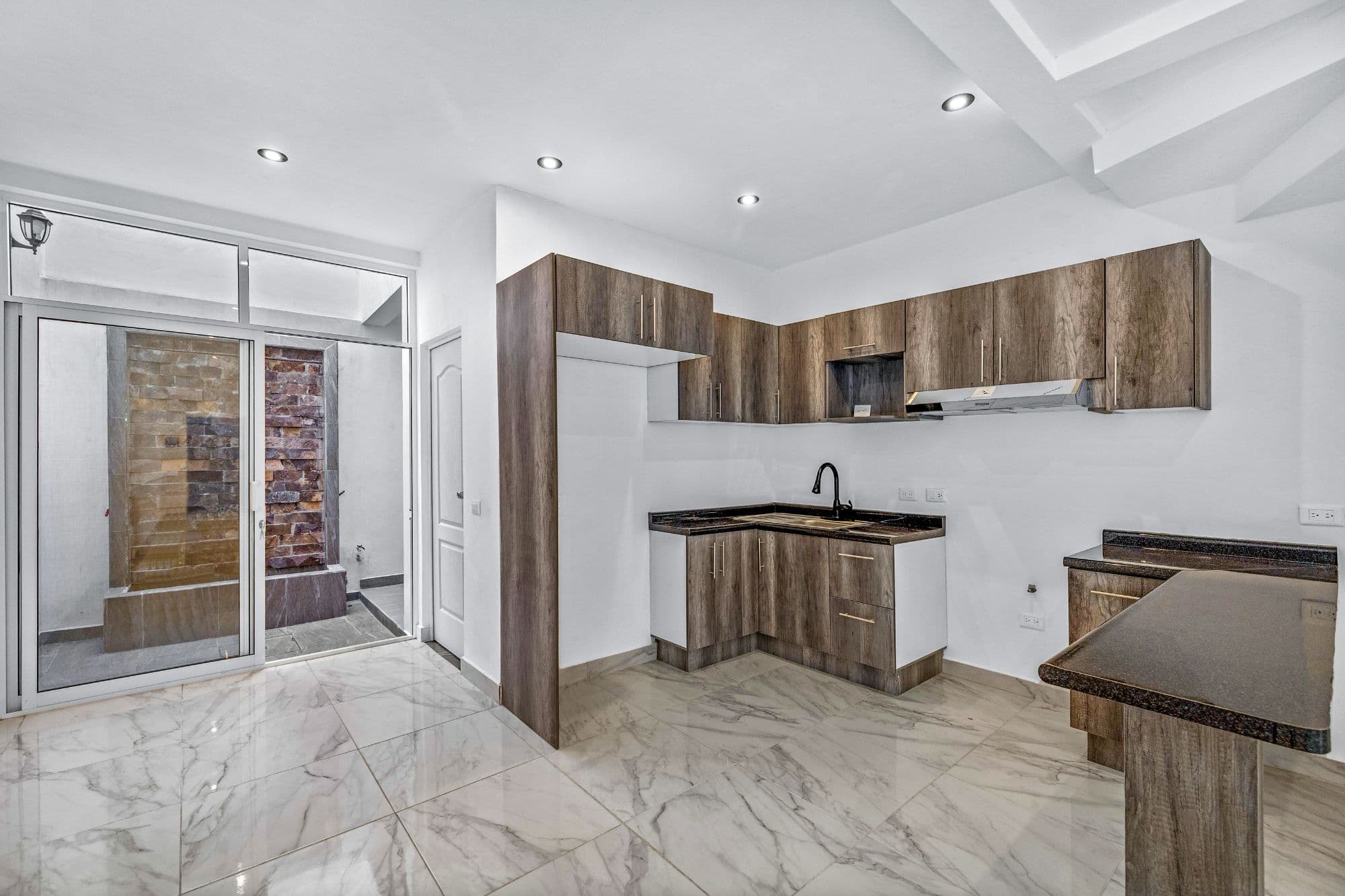 Casa Margarito — Guadalupe, San Miguel de Allende — photo 5 — contemporary kitchen, soaring coffered ceilings