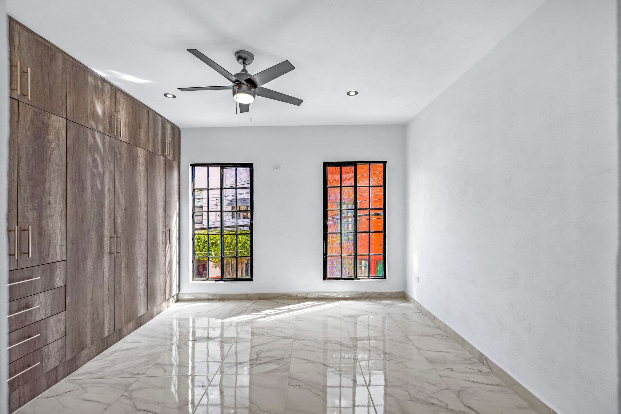 Casa Margarito — Guadalupe, San Miguel de Allende — photo 12 — luminous bedroom with architectural windows