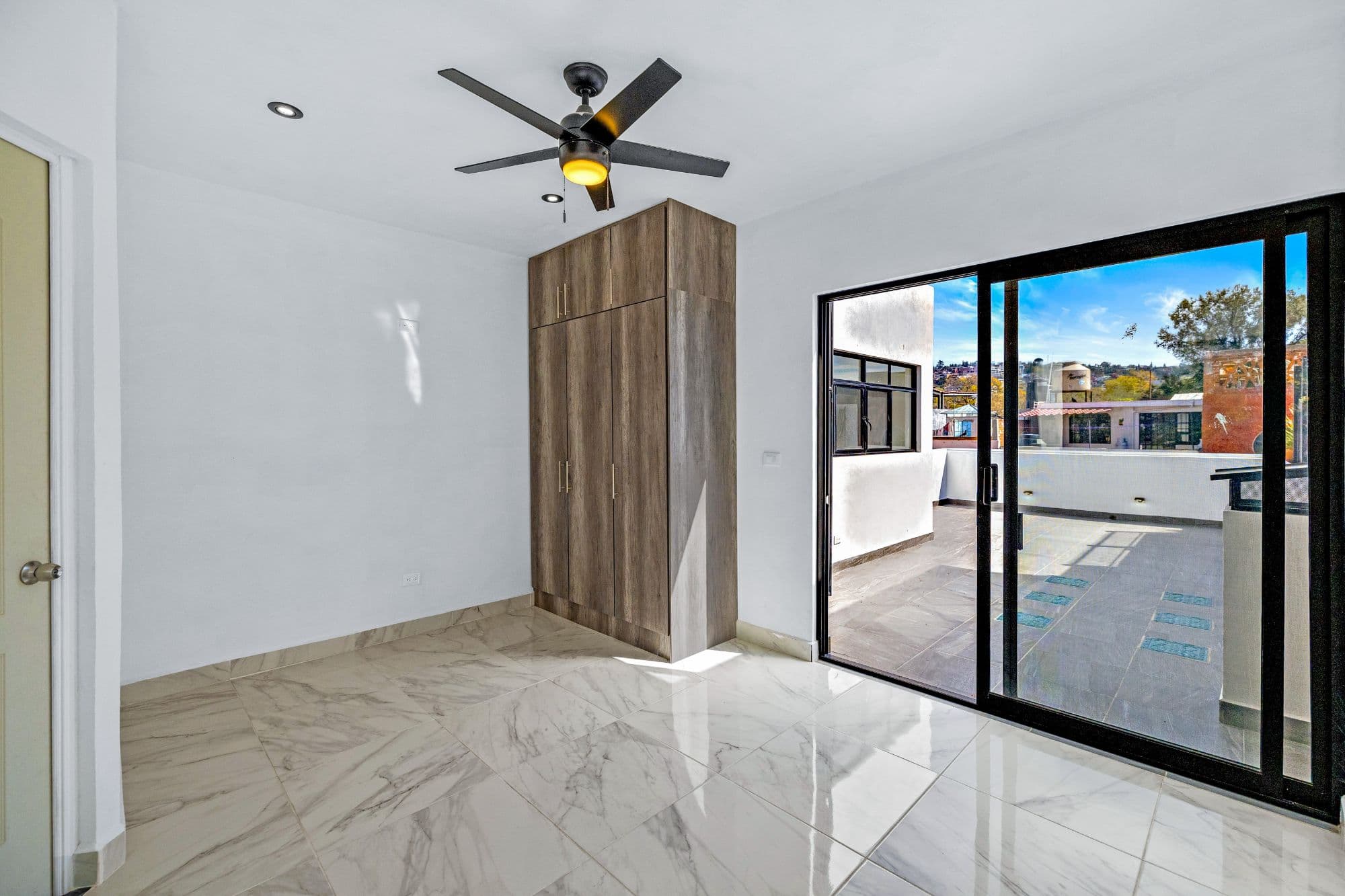 Casa Margarito — Guadalupe, San Miguel de Allende — photo 15 — sun-drenched bedroom with panoramic terrace views
