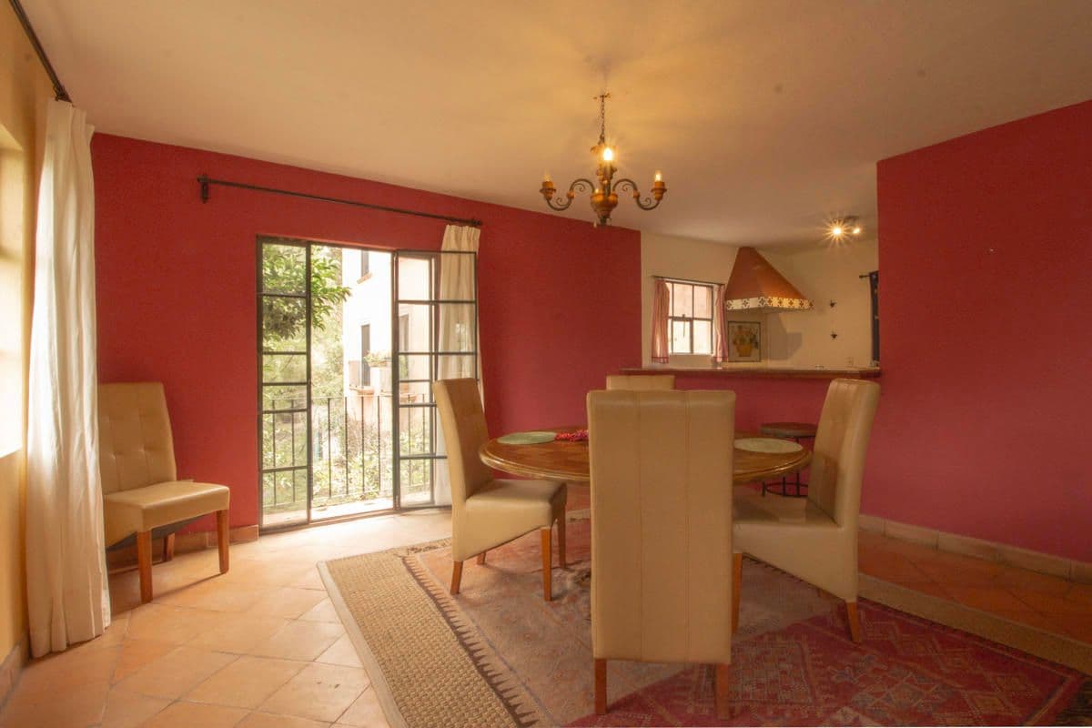 Condo for Sale in Santo Domingo, Atascadero — Centro, San Miguel de Allende — photo 14 — elegant dining room, radiant natural light