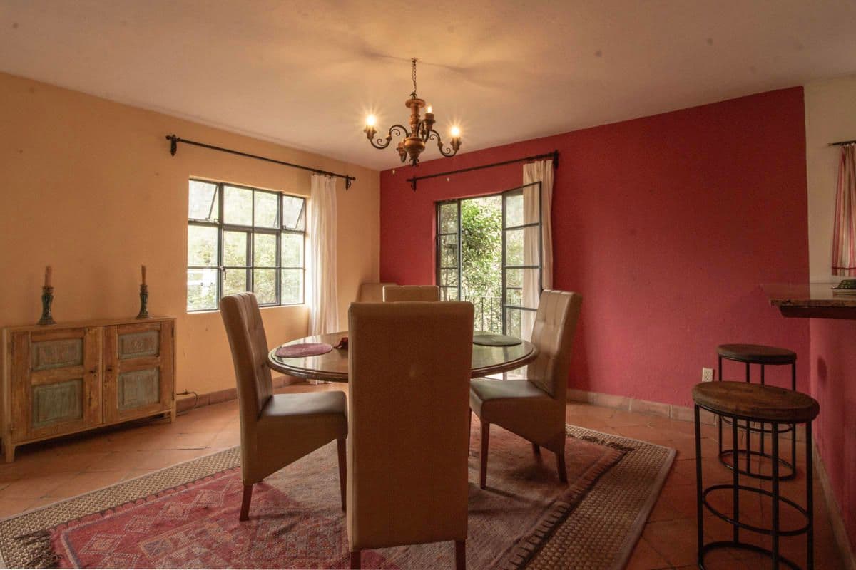 Condo for Sale in Santo Domingo, Atascadero — Centro, San Miguel de Allende — photo 18 — elegant dining room with vibrant character