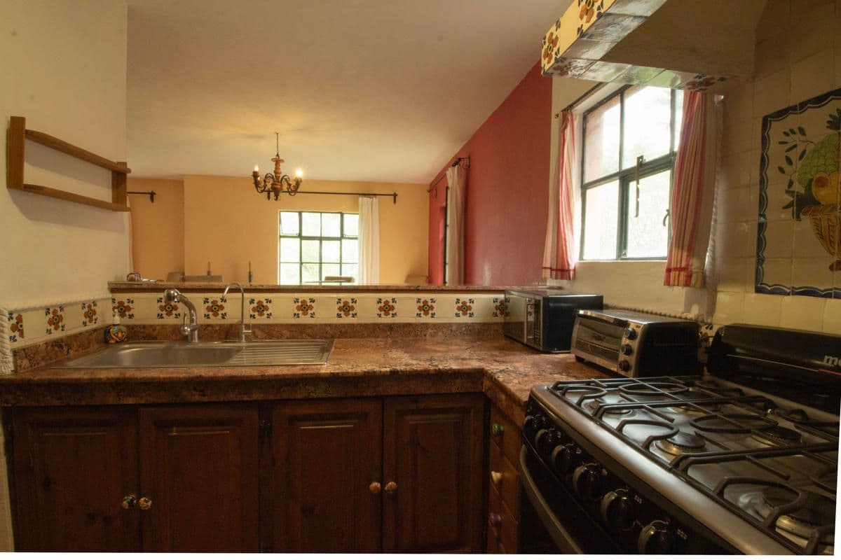 Condo for Sale in Santo Domingo, Atascadero — Centro, San Miguel de Allende — photo 9 — charming traditional mexican kitchen, sun-drenched