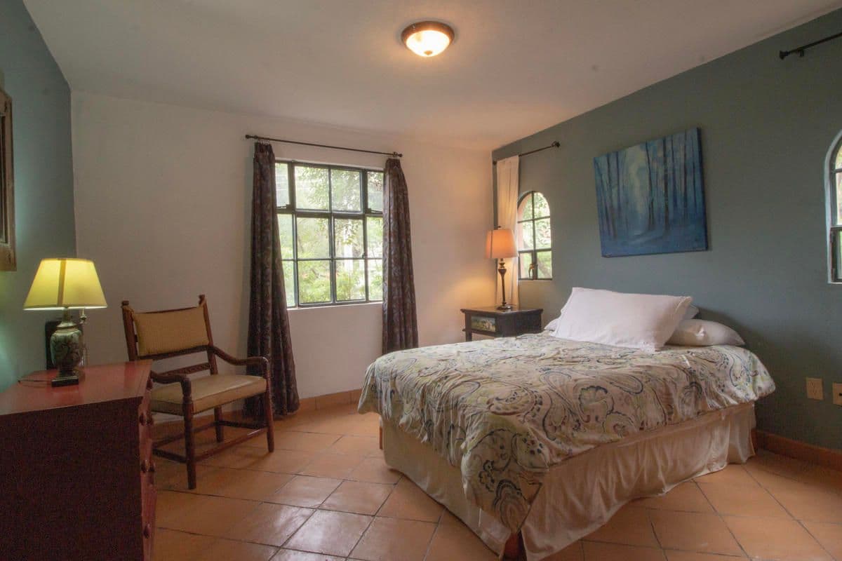 Condo for Sale in Santo Domingo, Atascadero — Centro, San Miguel de Allende — photo 3 — serene master suite, sunlit windows, terracotta charm