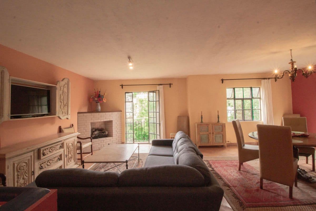 Condo for Sale in Santo Domingo, Atascadero — Centro, San Miguel de Allende — photo 20 — warm, sun-filled living space elegantly appointed