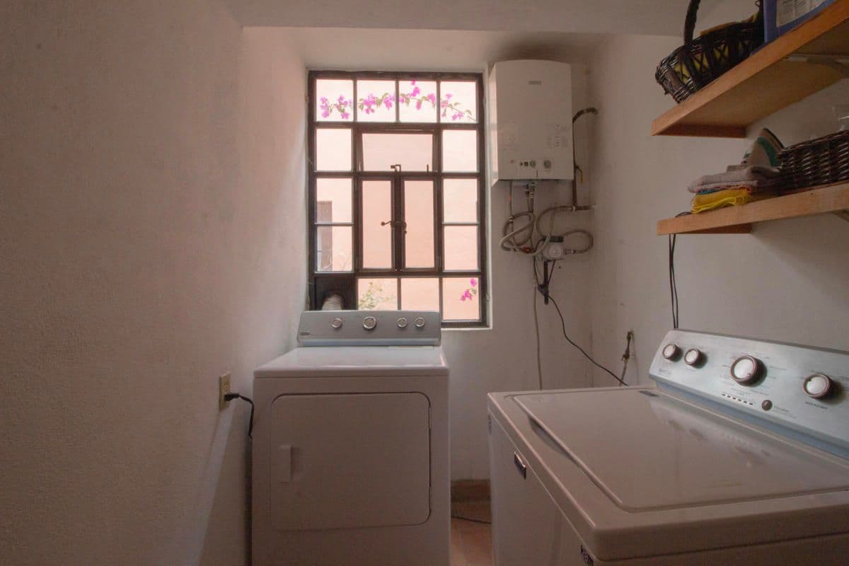 Condo for Sale in Santo Domingo, Atascadero — Centro, San Miguel de Allende — photo 8 — charming laundry room, abundant natural light
