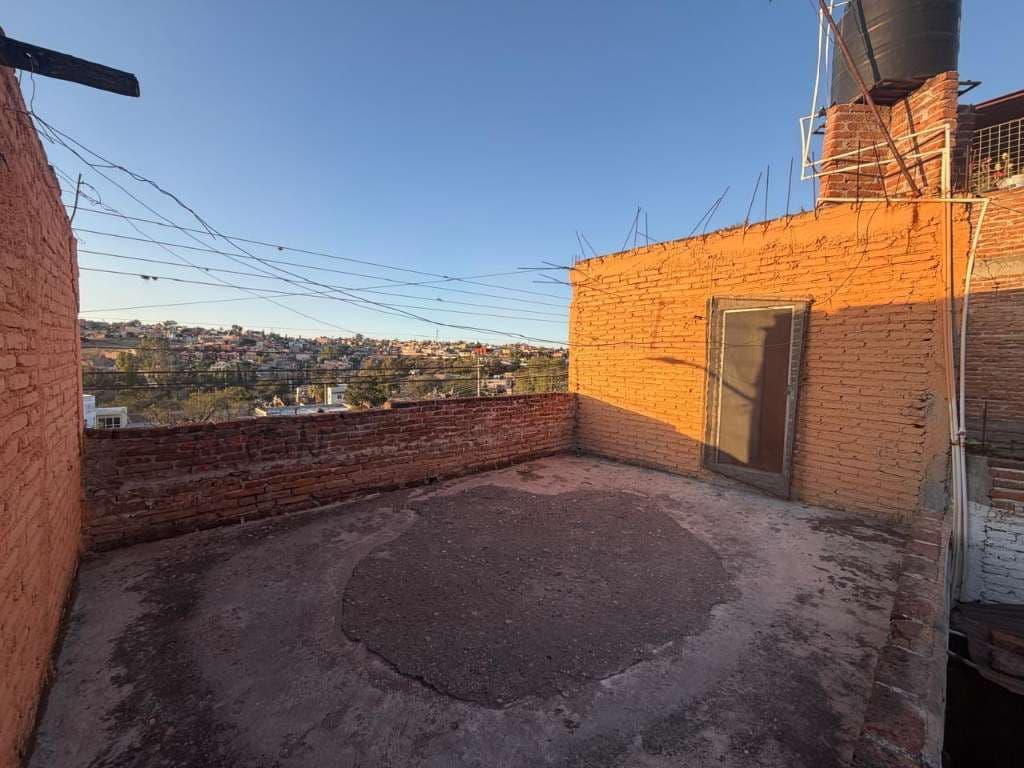 CASA AMARILLA — San Antonio, San Miguel de Allende — photo 5 — sunlit rooftop terrace, expansive valley views