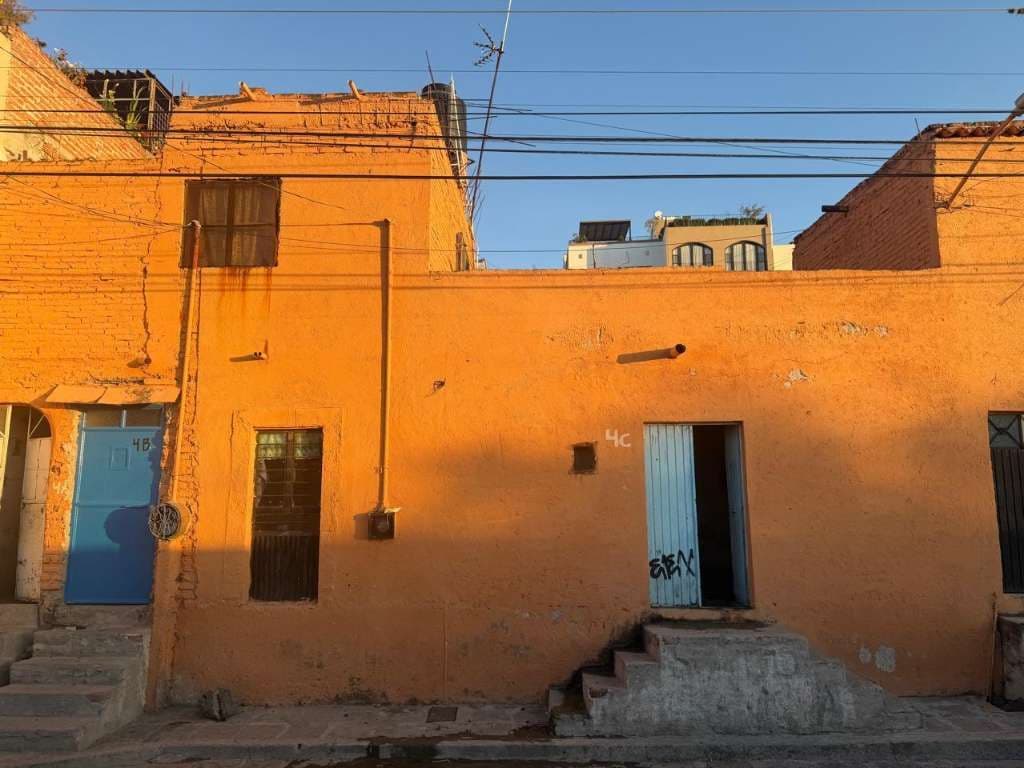 CASA AMARILLA — San Antonio, San Miguel de Allende — photo 8 — charming terracotta facade, authentic character
