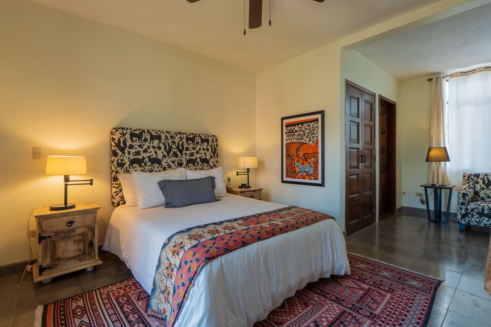 Casa Leslie — San Antonio, San Miguel de Allende — photo 15 — artisan-inspired bedroom, warm ambient light