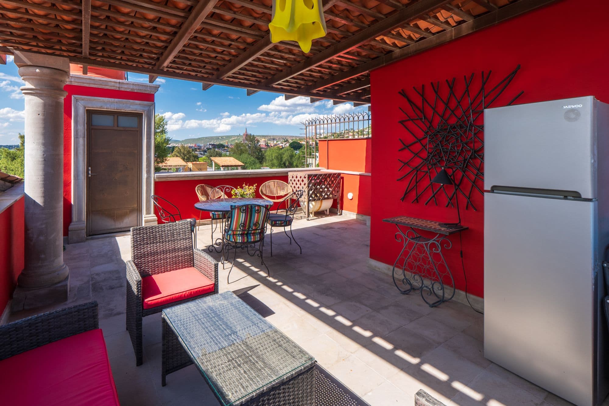 Casa Leslie — San Antonio, San Miguel de Allende — photo 22 — vibrant rooftop terrace, panoramic city views