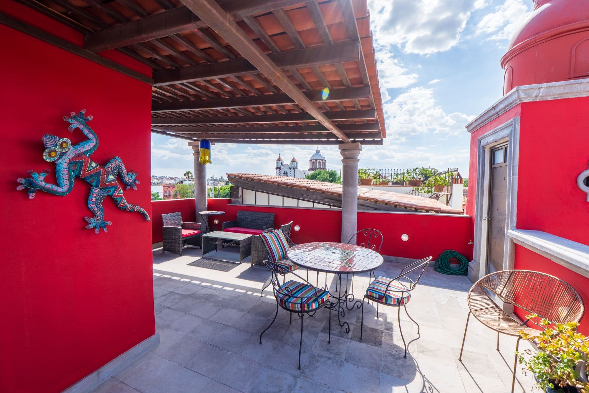 Casa Leslie — San Antonio, San Miguel de Allende — photo 20 — vibrant rooftop terrace, cathedral views