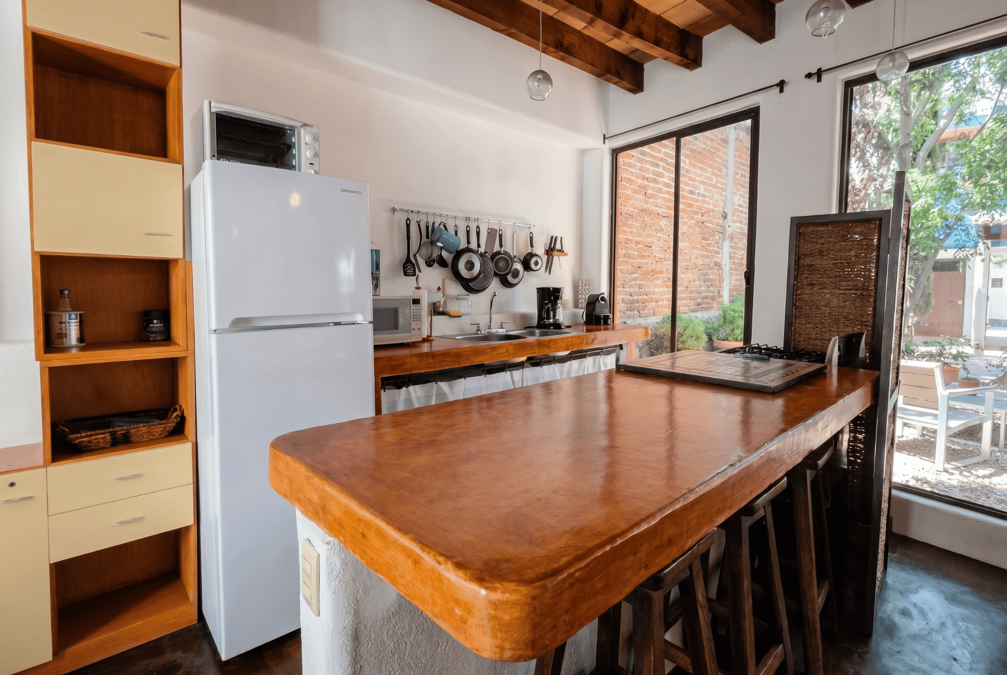 Casa Toro — San Miguel de Allende Centro, San Miguel de Allende — photo 13 — artisan kitchen with abundant natural light