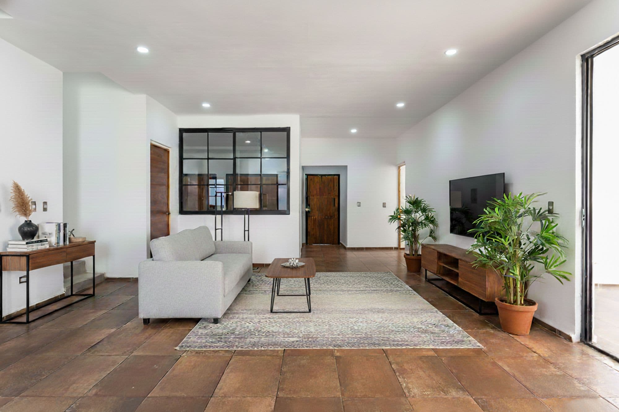Casa Albor — La Palmita, San Miguel de Allende — photo 25 — contemporary living space, warm wood flooring
